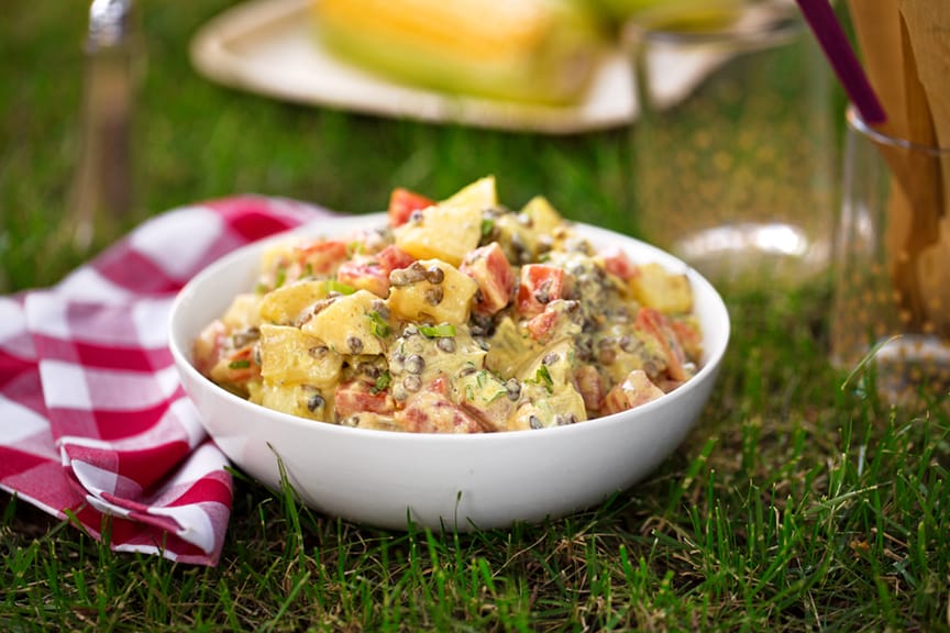 curried potato salad being served