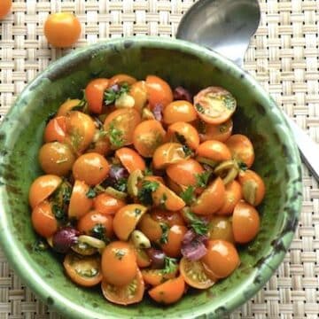 Golden tomatoes with garlic and parsley