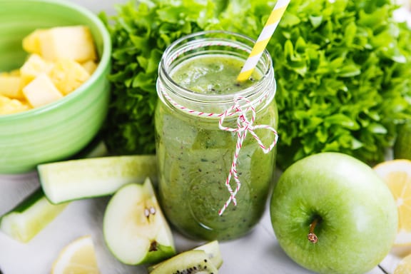 pineapple, apple, and leafy greens smoothies