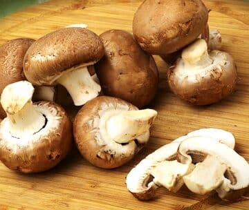 Mushrooms on cutting board