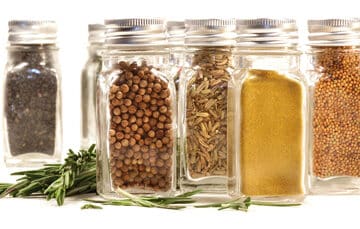 Spice jars with various spices