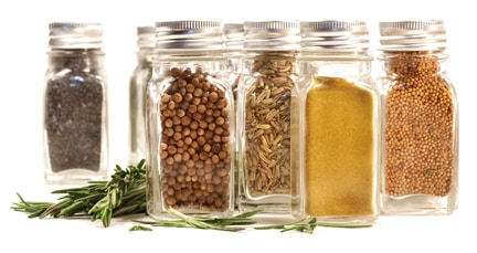 Spice jars with various spices