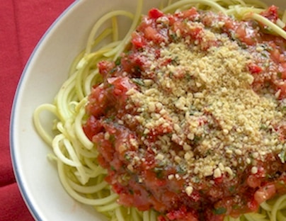 Raw zucchini "noodles" with raw vegan parmesan-style cheese