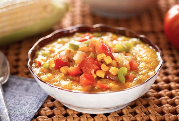 Hominy grits with corn and tomatoes