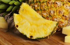 Fresh pineapple on table