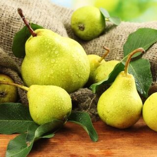 Juicy pears on table