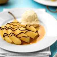 Poached pear with chocolate drizzle
