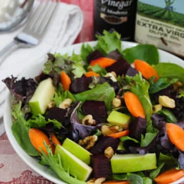 Mixed greens salad with apple and pickled beets