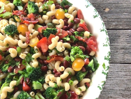Pasta salad with red beans, tomatoes,  and broccoli