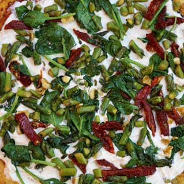 Vegan white pizza with asparagus and spinach