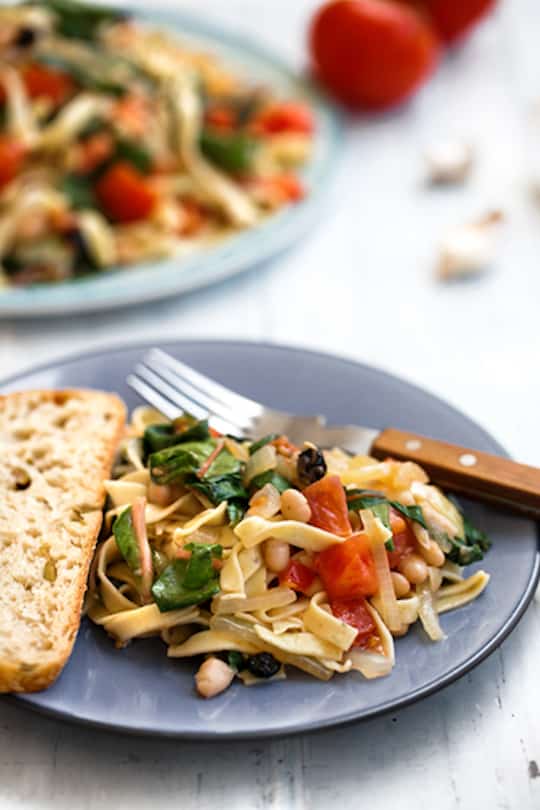 Pasta with chard, tomatoes, and white beans