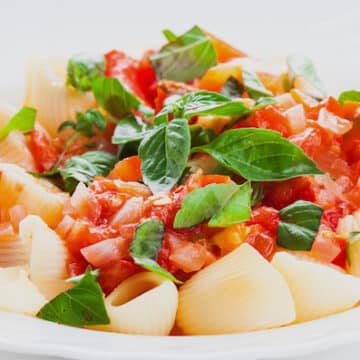 Cold pasta with fresh tomatoes and basil
