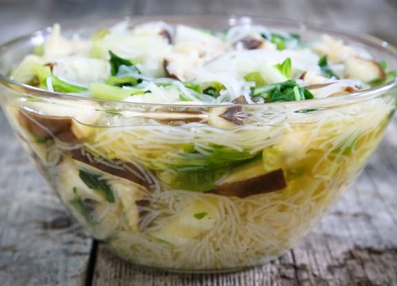 Rice Noodle Soup with Lettuce and Mushrooms