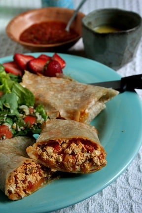 scrambled tofu burrito being served