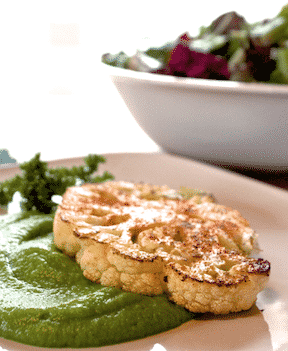 Cauliflower Steaks with green pea puree by helyn dunn