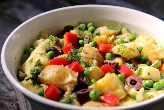 Herbed potato salad with green peas