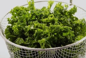 Curly kale in colander