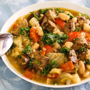 White bean and kale stew with fennel and vegan sausage stew