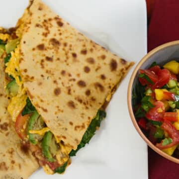 Big quesadillas with refried beans and spinach