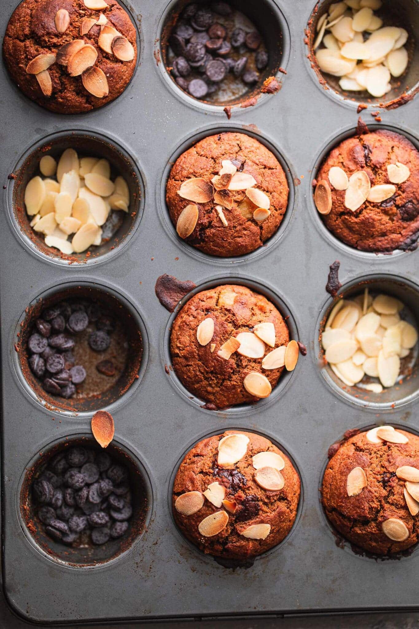vegan pumpkin chocolate chip muffins in a muffin tray