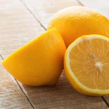 Fresh lemons on table