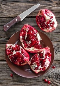 Pomegranates on table