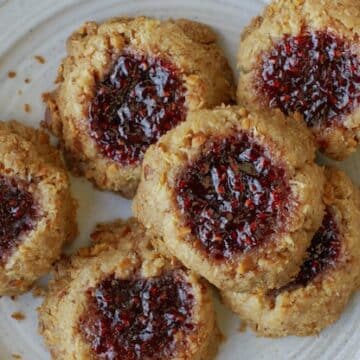 Coconut, almond, and raspberry jam thumbprint cookie