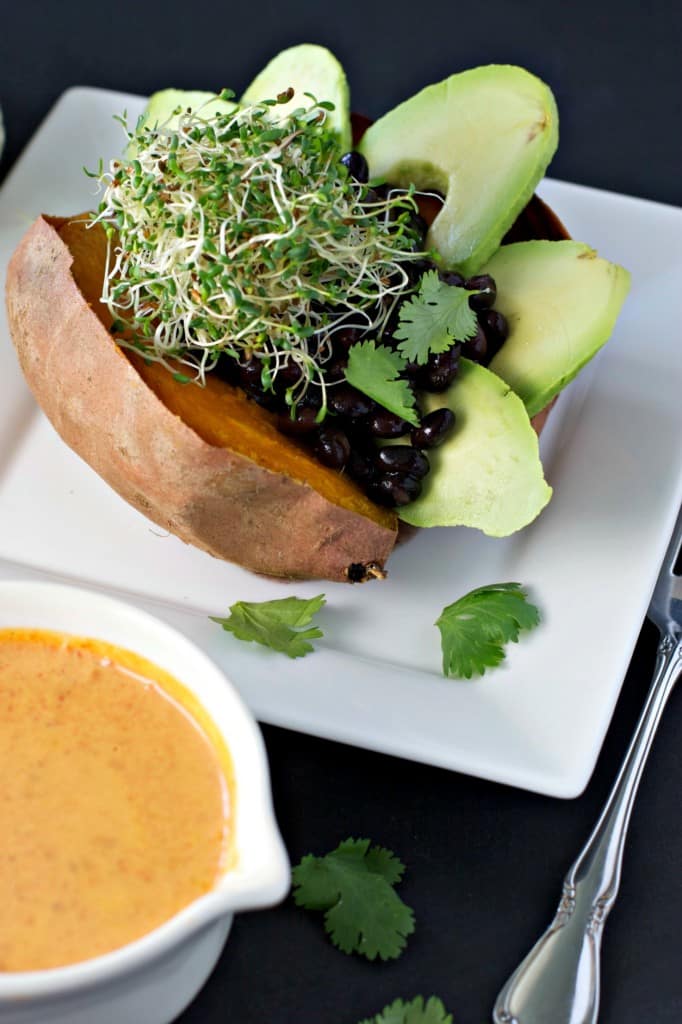 Stuffed Sweet Potato with Black Beans and Avocado from Christina Cavanaugh