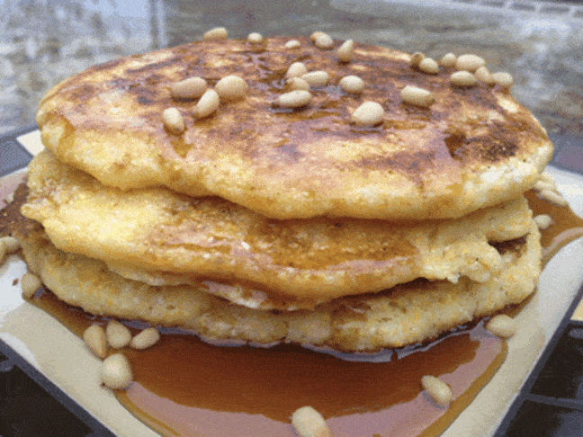 cornmeal pancakes being served