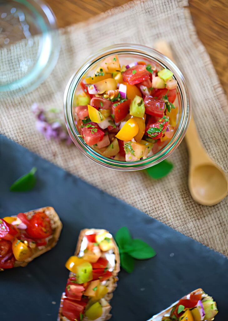 homemade tomato relish in a jar and bruschetta