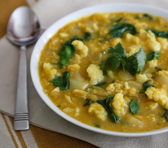 cauliflower lentil soup being served