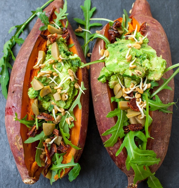 Arugula olives avocado stuffed sweet potatoes