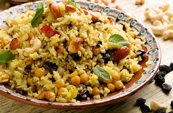 Brown rice pilaf with dried fruits, nuts, and chickpeas