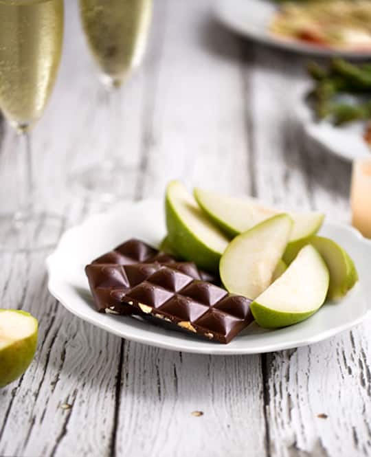 Dark chocolate served with pears