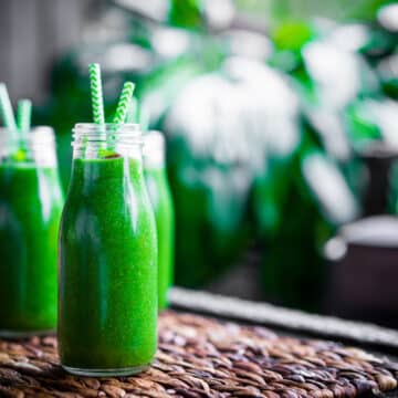 Fresh green smoothie outdoors