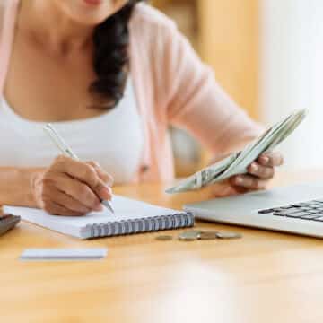 Woman distributing family budget