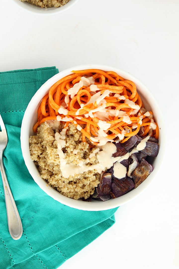 sweet potato roasted onion and quinoa bowl with maple tahini dressing