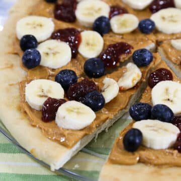 Breakfast peanut butter and jam pizza