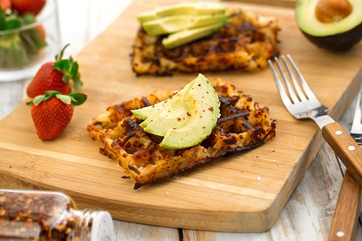 hash brown waffles being served on a cutting board