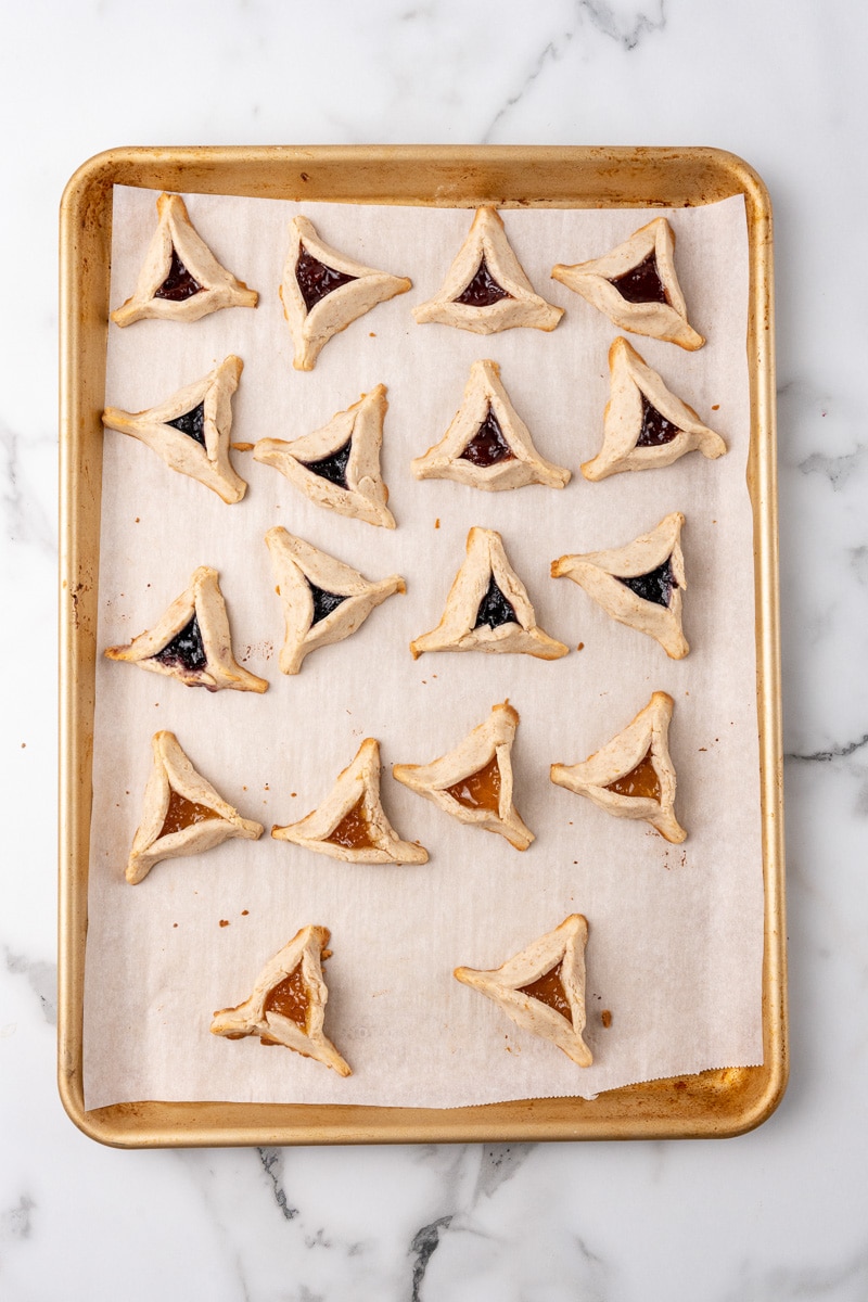 vegan hamantaschen on a baking sheet