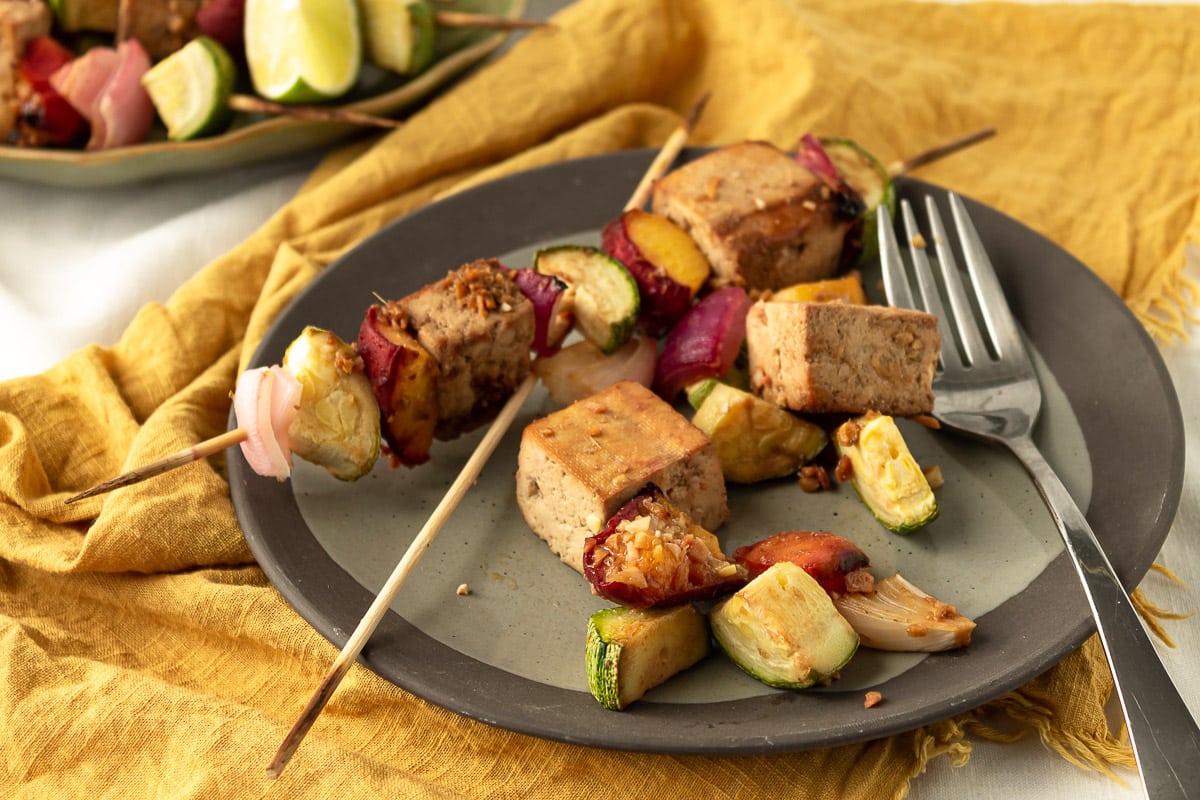 plate of one kebab and one unskewered kebab