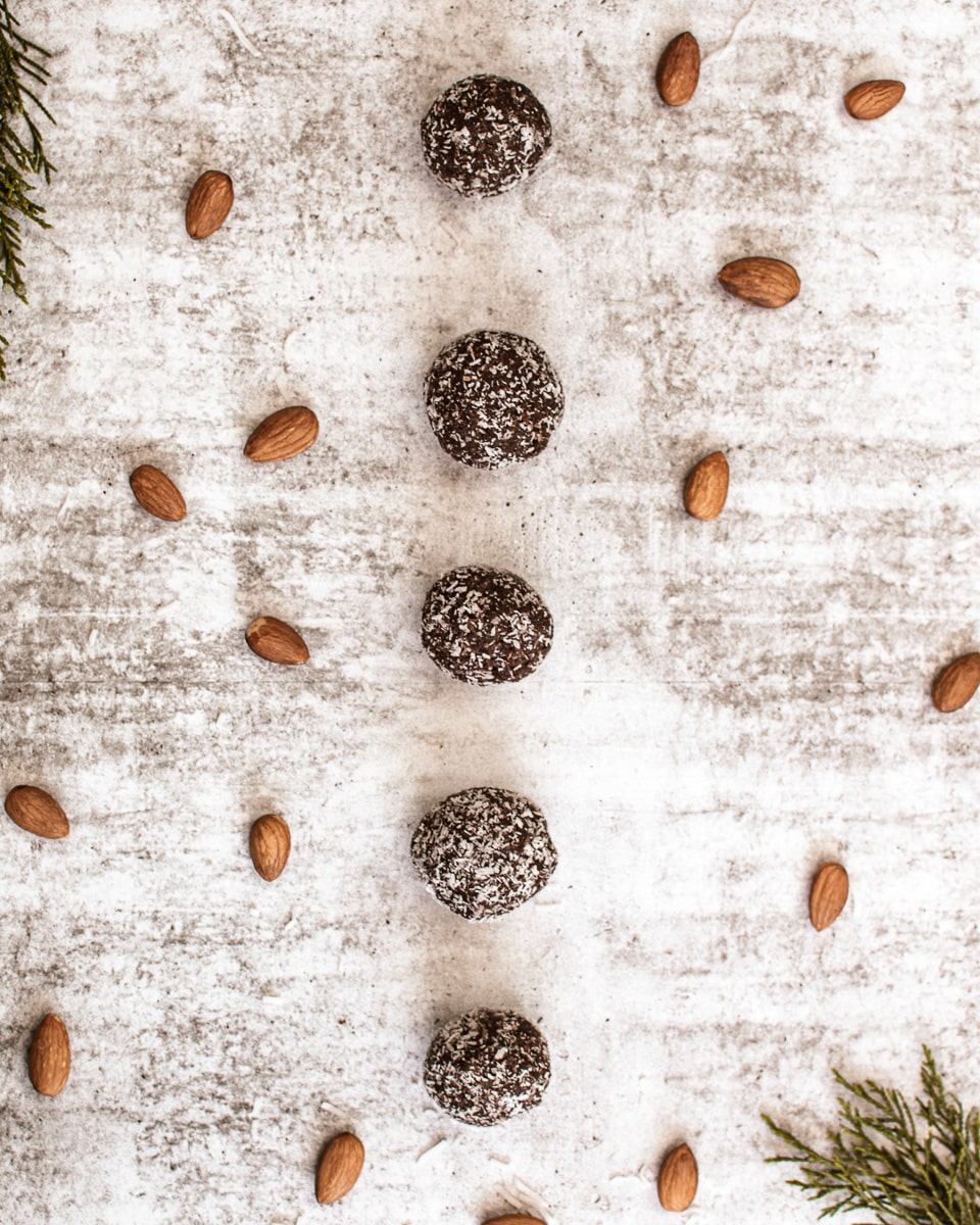 row of almond butter protein balls on counter