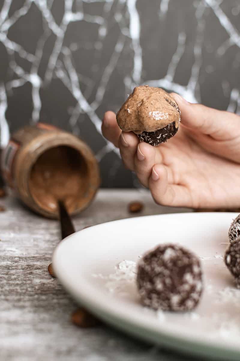 almond butter protein ball covered in almond butter