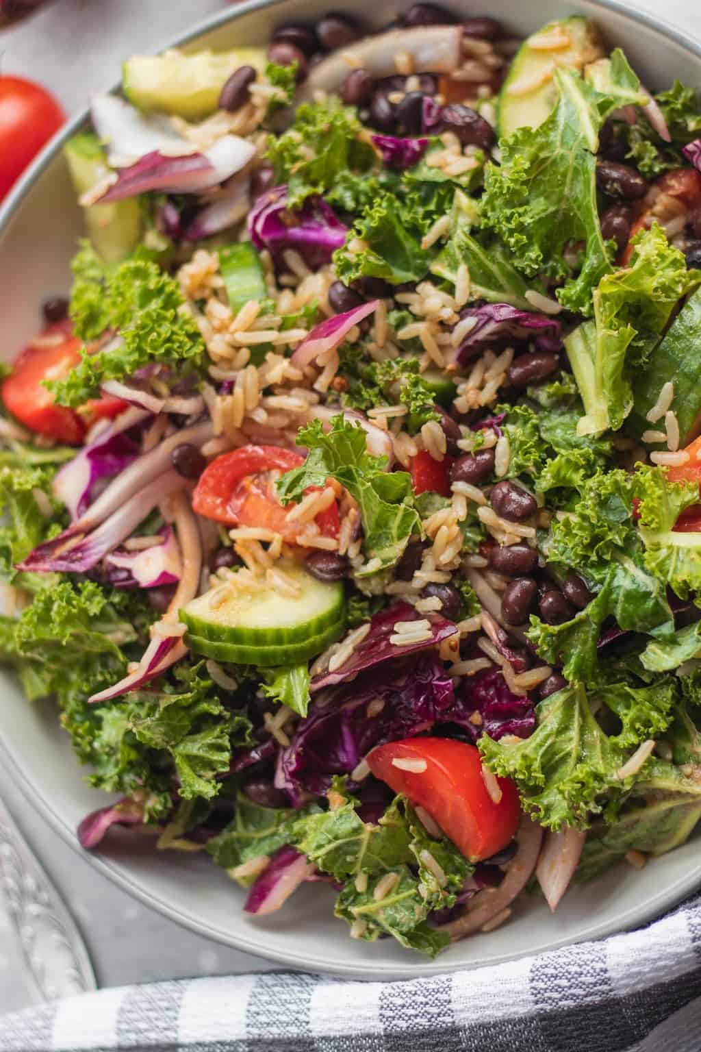 kale salad with fresh veggies and rice