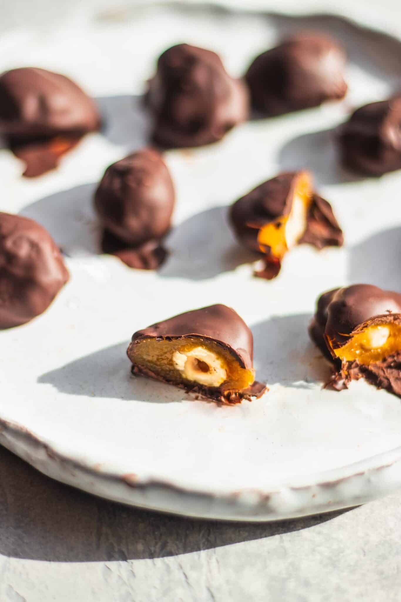 Vegan homemade chocolates with apricots and hazelnuts