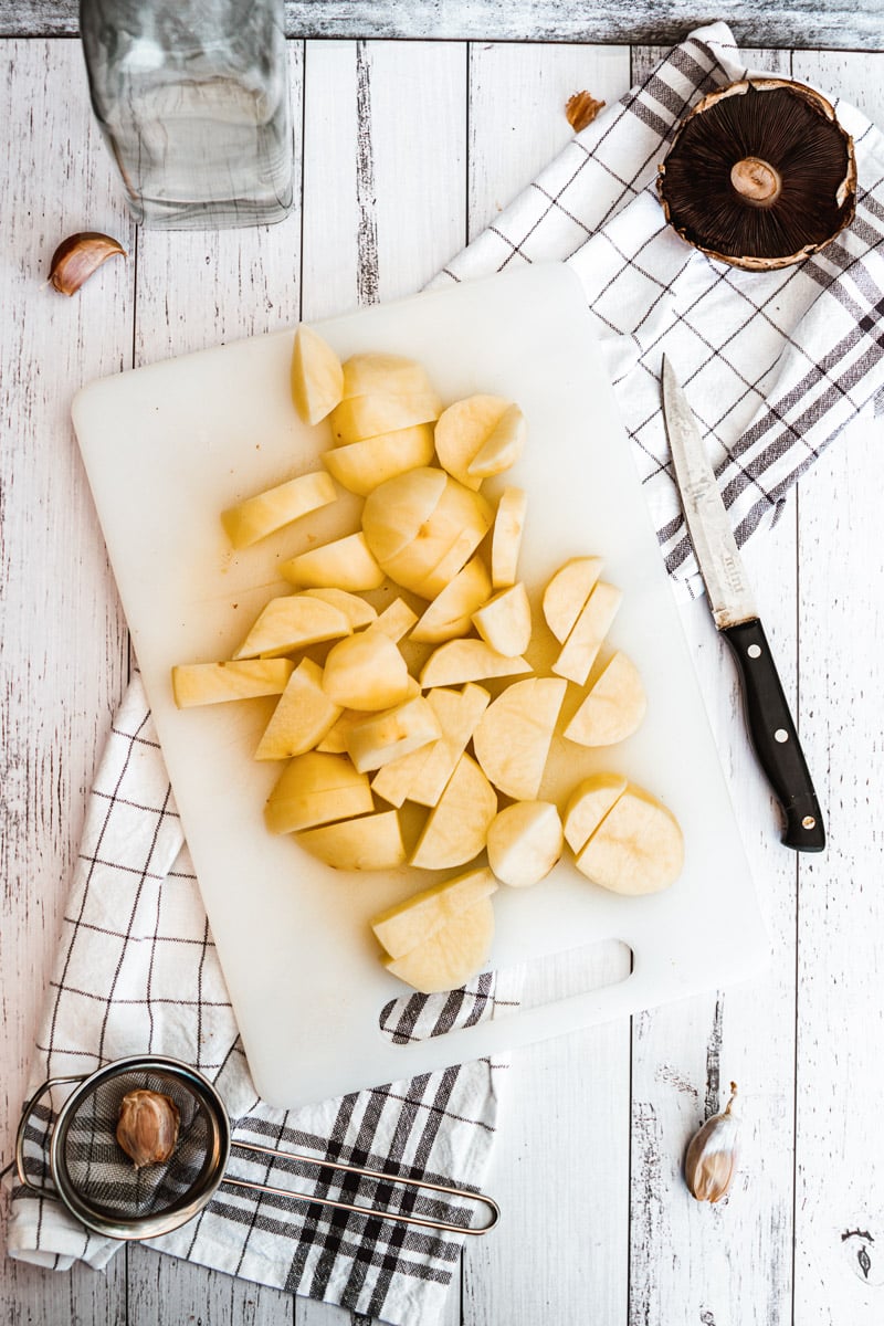 chopped potatoes on a cutting board