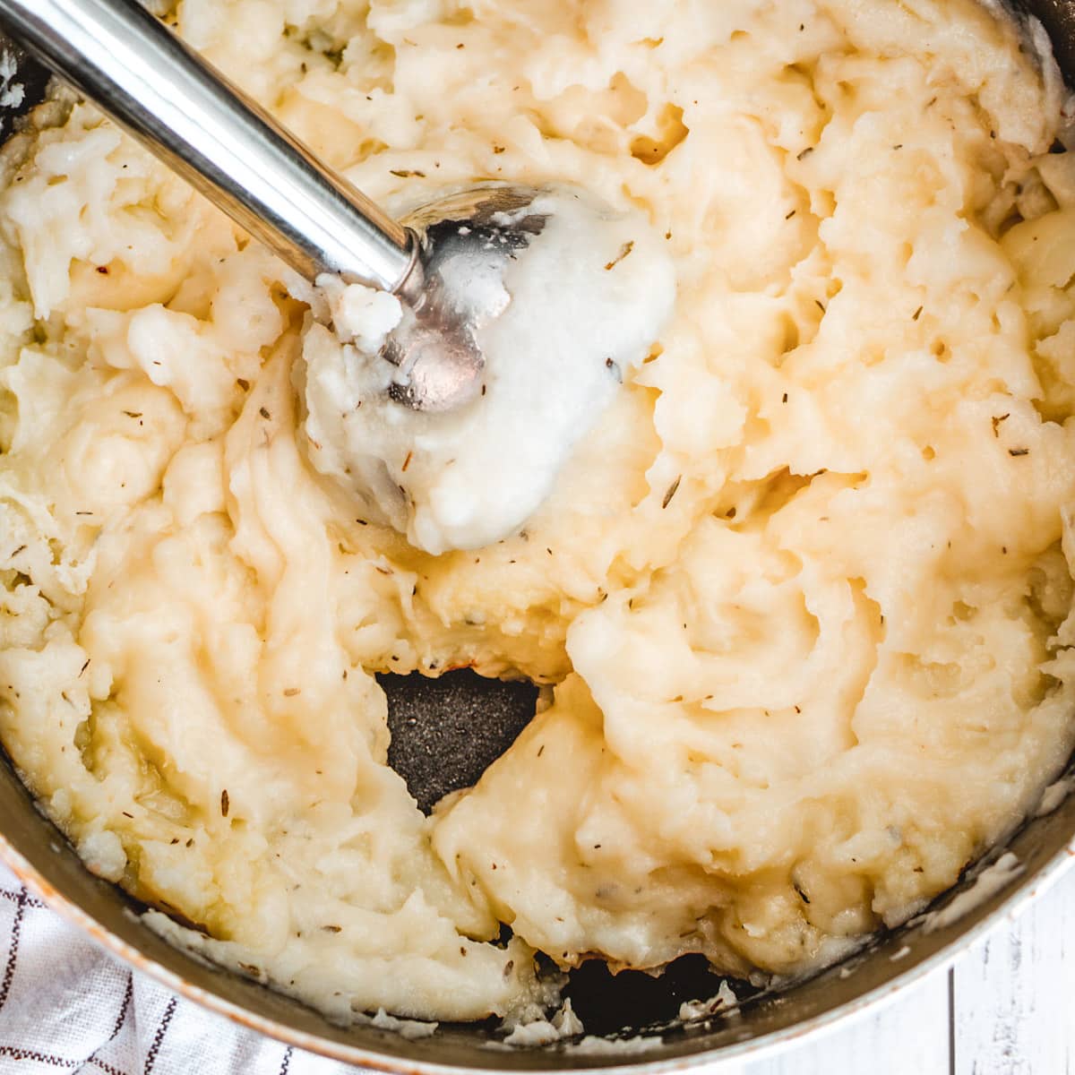 immersion blender in a pot of vegan mashed potatoes