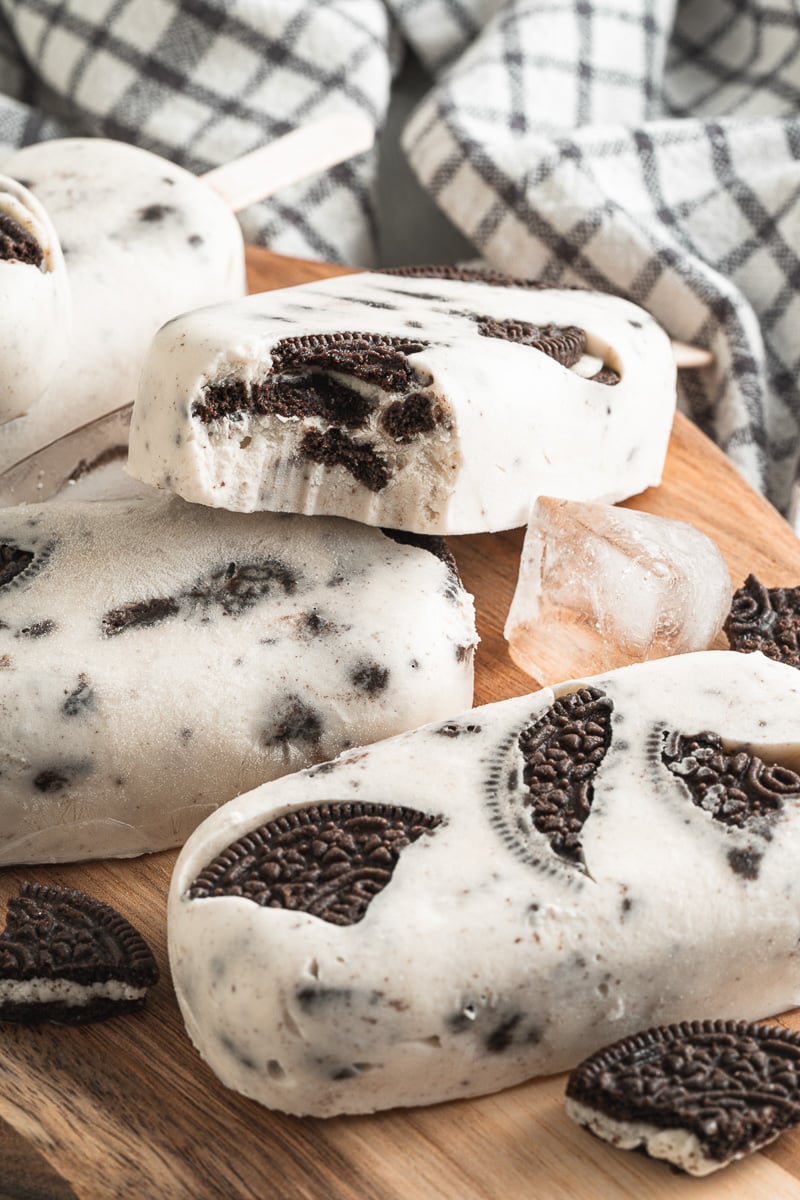 cookies & cream vegan popsicles with a bite taken out