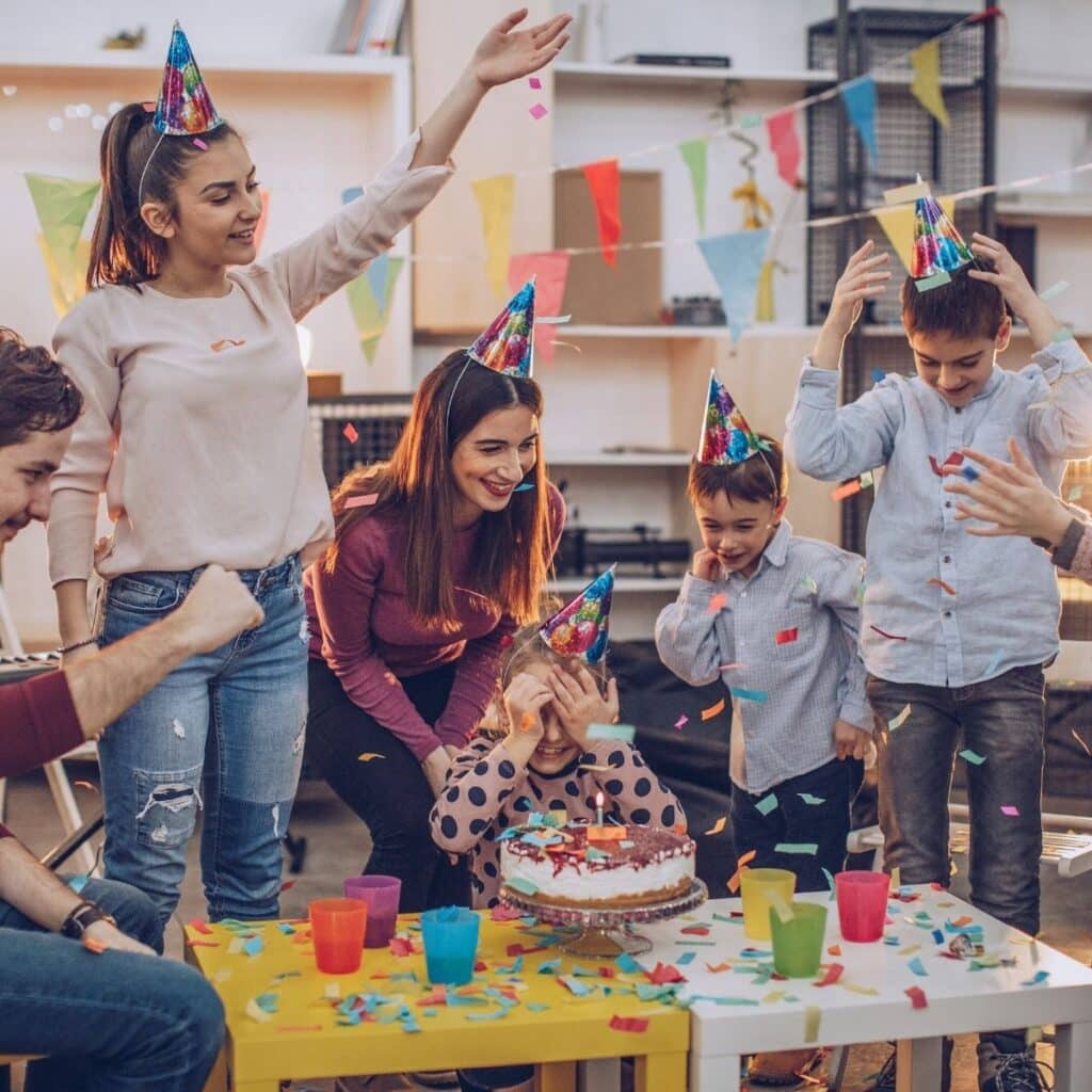 kids celebrating a birthday party in classroom