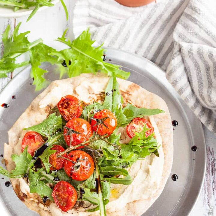 Image for Hummus Flatbread Pizza with Cherry Tomatoes & Dandelion Greens
